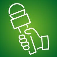 Symboldbild: Hand mit Mikrofon