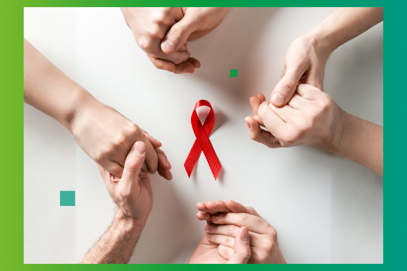 sich reichende Hände und eine rote Schleife als Symbol für AIDS